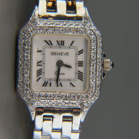 Appraisal: Geneve Diamond Wristwatch tank style round diamonds totaling carat in