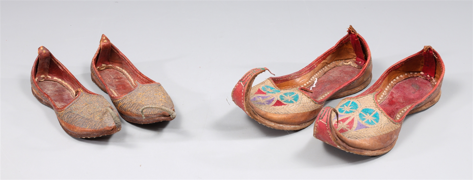 Appraisal: Group of four vintage Punjabi Jutti shoes Pair with blue