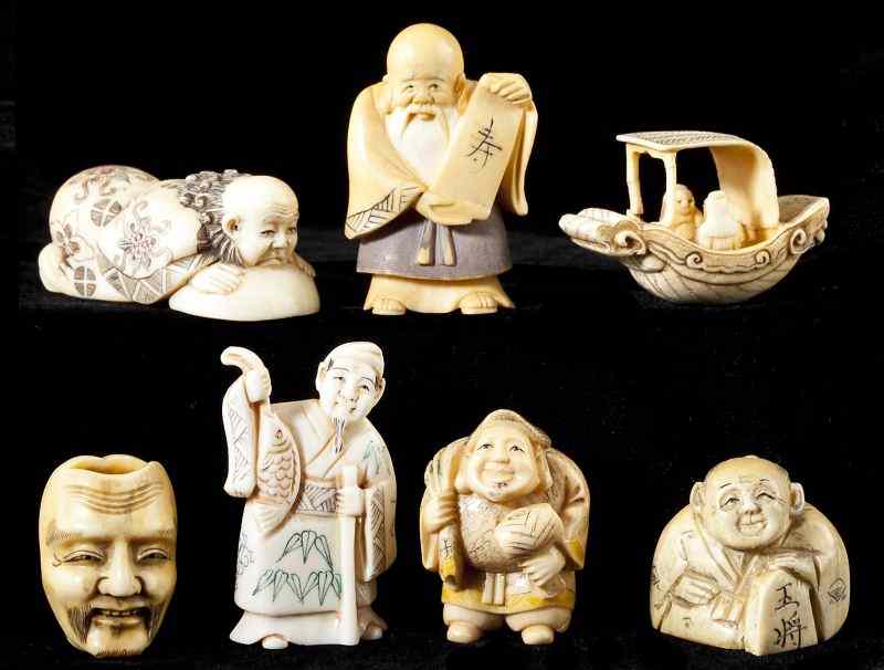 Appraisal: Group of Seven Japanese Figural Netsukescarved ivory most signed some