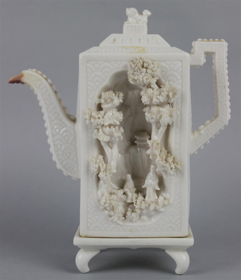 Appraisal: CHINESE BLANC-DE-CHINE TEAPOT AND COVER the tall narrow pot molded