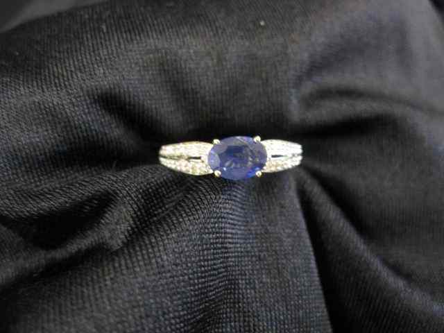 Appraisal: Sapphire Diamond Ring carat richblue oval gem with diamonds on