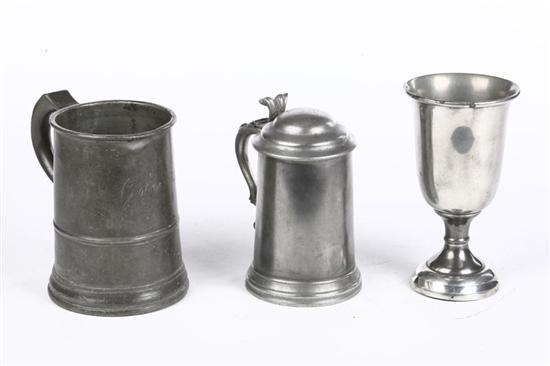 Appraisal: THREE PEWTER PIECES Nineteenth century English quart measure h and