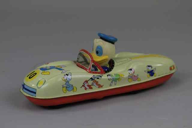 Appraisal: DONALD DUCK RIDING AUTO Modern Toys Japan copy Walt Disney