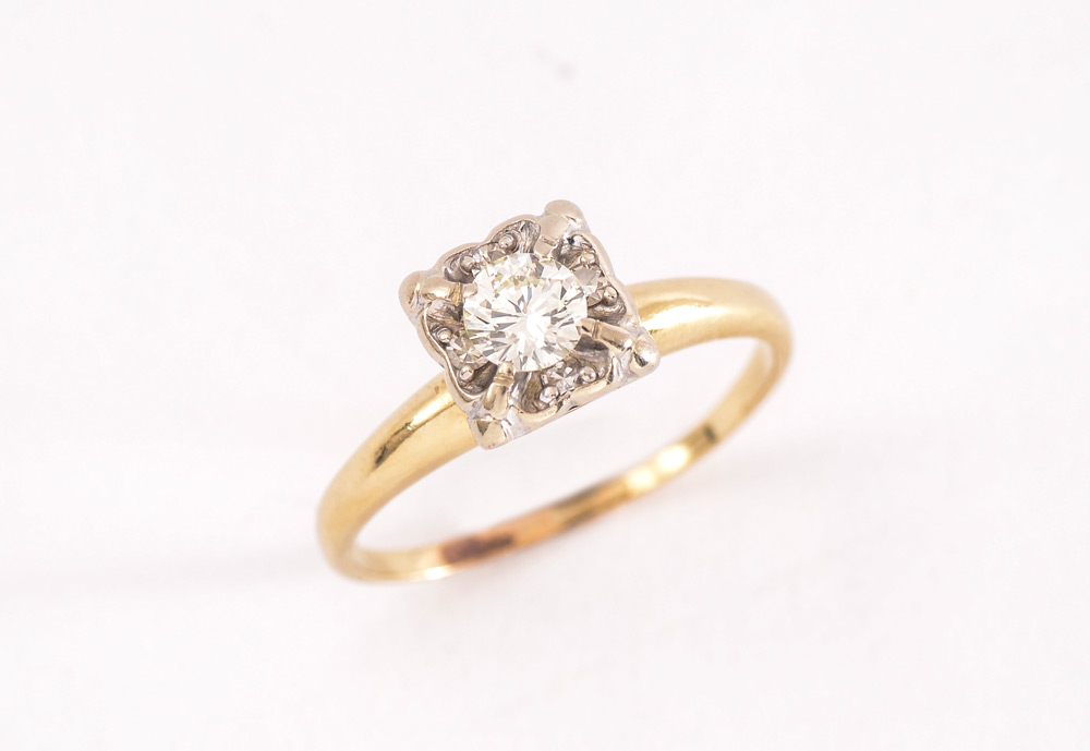 Appraisal: DIAMOND ENGAGEMENT RING k white and yellow gold ring centering