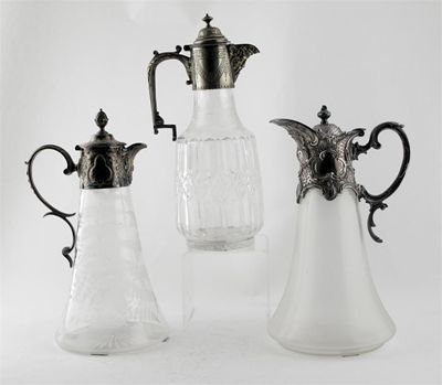 Appraisal: Three various plated mounted clear glass claret jugs