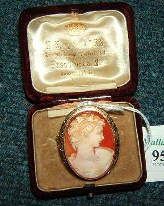 Appraisal: A ct gold framed oval cameo brooch depicting a portrait