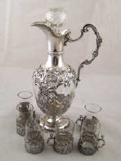 Appraisal: A late Victorian silver mounted liqueur decanter set by William