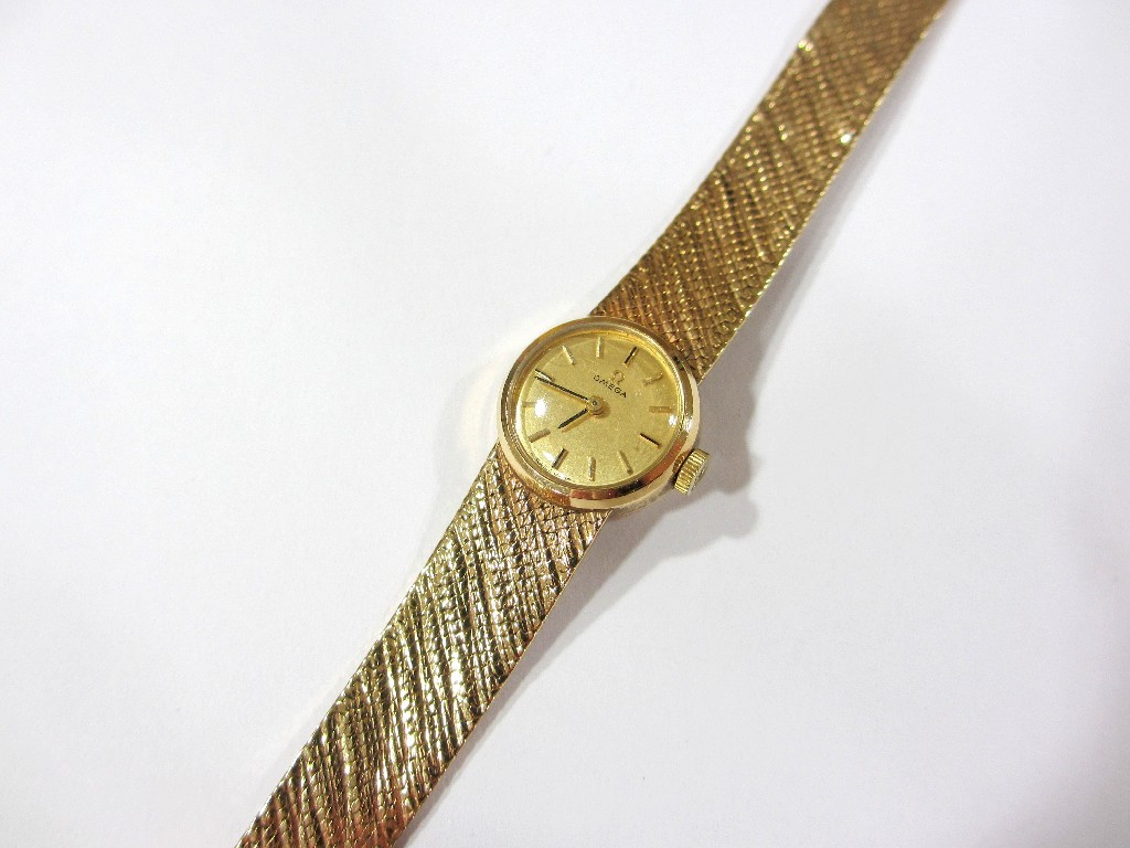 Appraisal: A ladies ct gold Omega wrist watch with integral gold