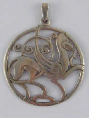 Appraisal: A Scottish silver pendant with stylised heraldic beast a copy