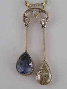 Appraisal: A diamond and blue stone negligee pendant the principal pear