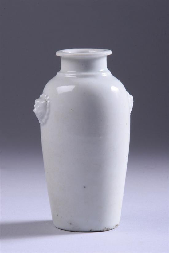 Appraisal: CHINESE BLANC-DE-CHINE PORCELAIN VASE Ovoid-form flanked by two fu lion