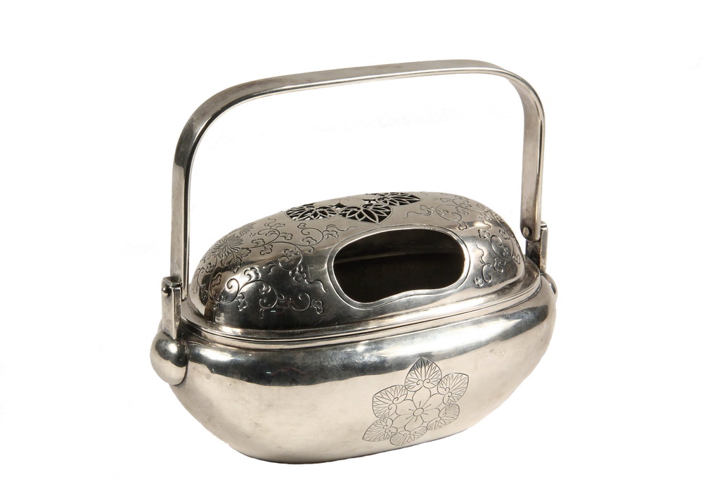 Appraisal: JAPANESE SILVER WARMER - Traveler's Hand Warmer utilizing charcoal late