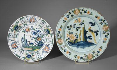 Appraisal: Two Delft chargers one with polychrome pineapple and floral border