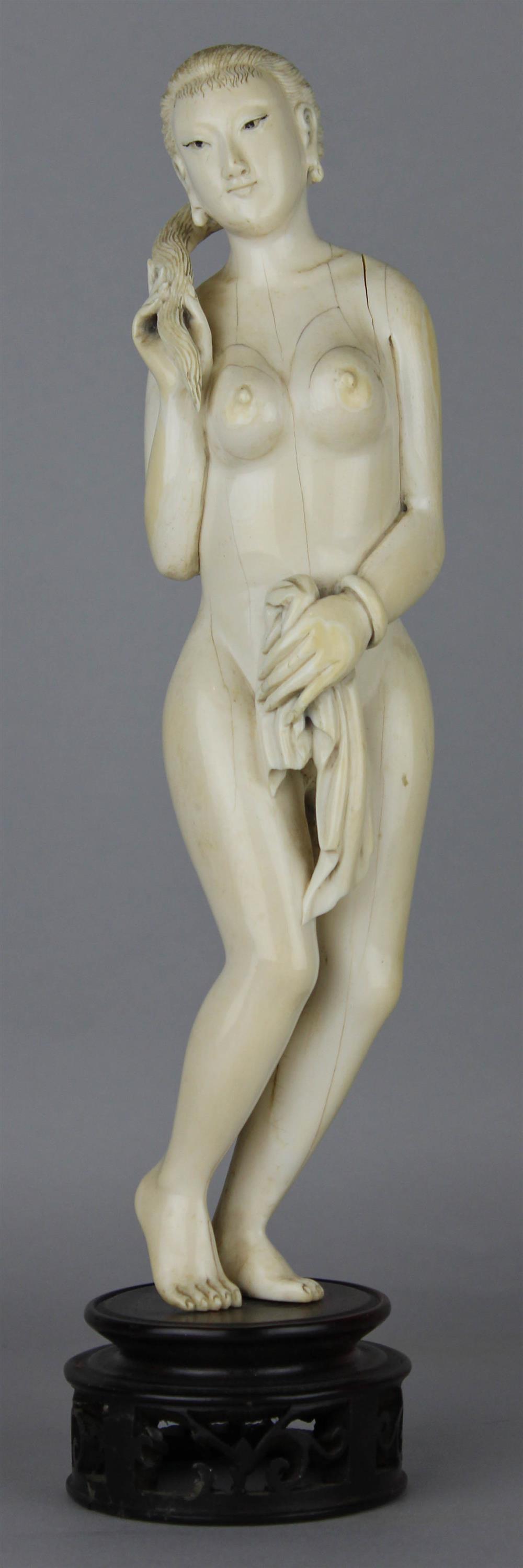 Appraisal: CHINESE IVORY FIGURE OF A NUDE BEAUTY TH C the