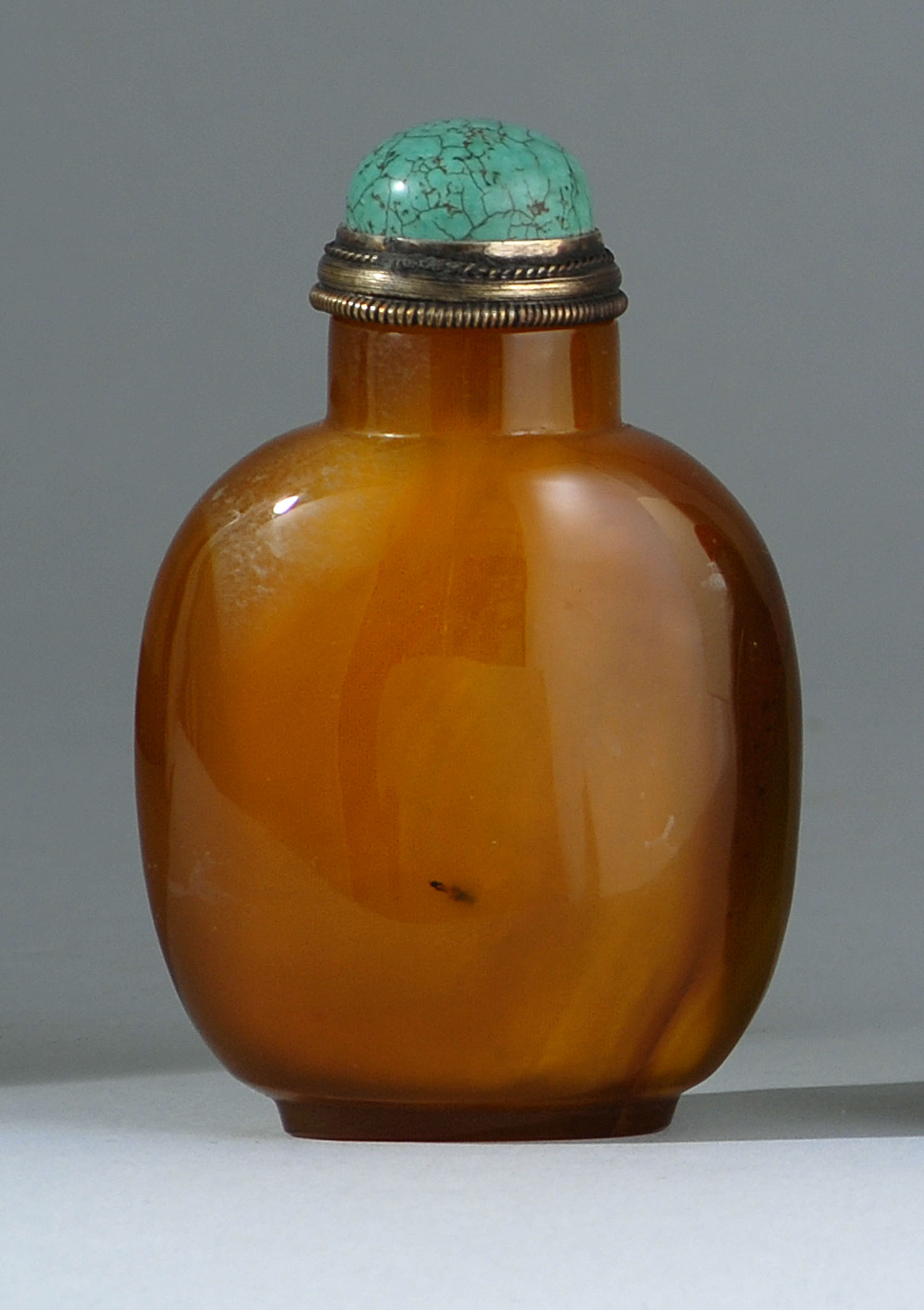 Appraisal: GOLDEN HONEY CHALCEDONY AGATE SNUFF BOTTLE th CenturyIn elongated ovoid