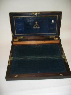 Appraisal: A VICTORIAN BRASS BOUND ROSEWOOD WRITING BOX the hinged cover