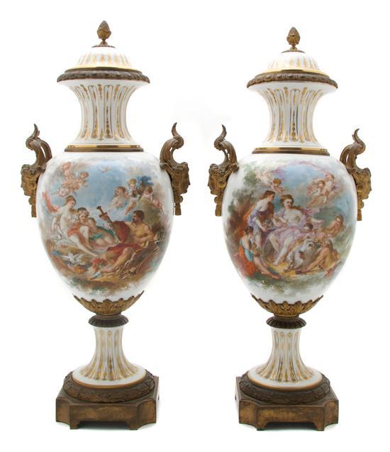 Appraisal: A Pair of Sevres Style Gilt Bronze Mounted Vases decorated