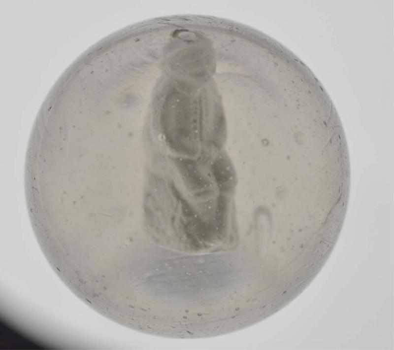 Appraisal: Seated Boy Sulphide Marble Description Depicts boy wearing a hat