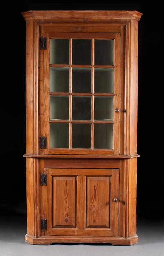 Appraisal: Federal pine glazed panel door corner cupboard Pennsylvania or South