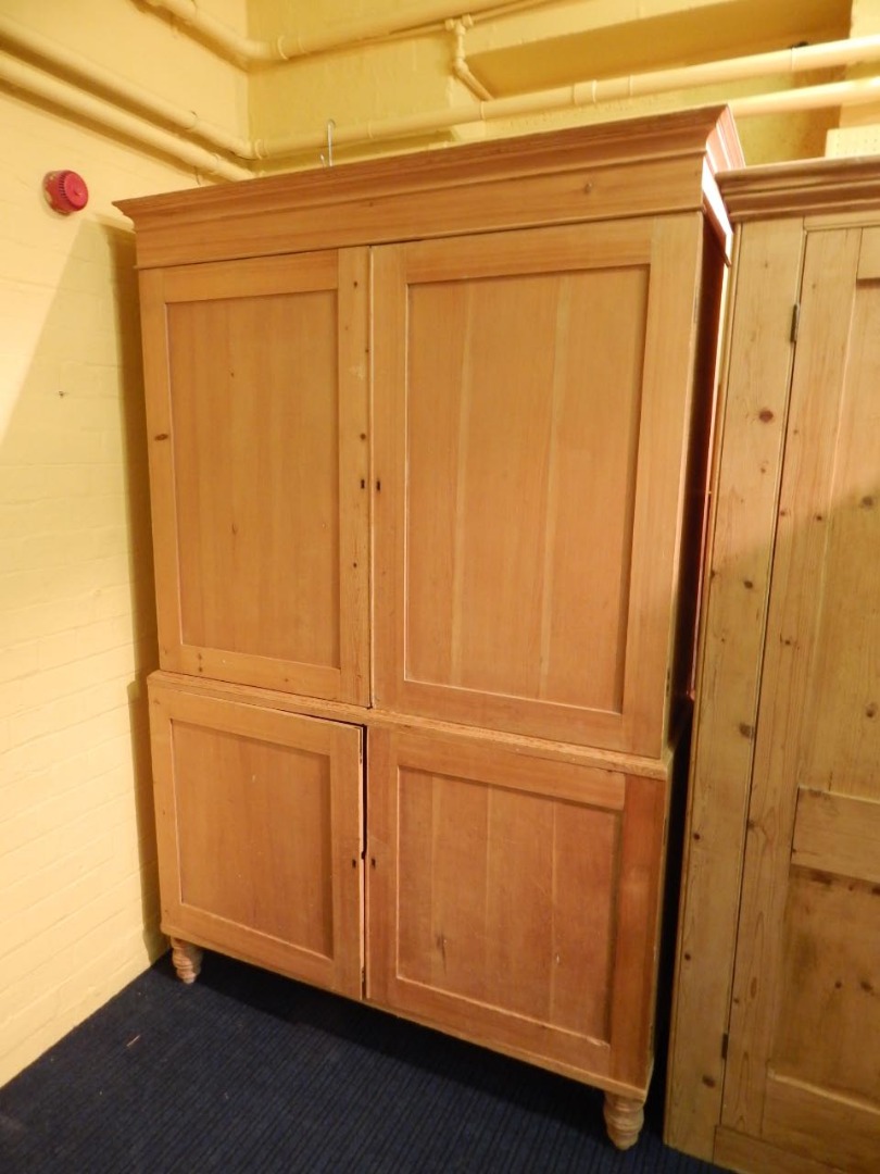 Appraisal: A Victorian pine cupboard the top with a moulded cornice