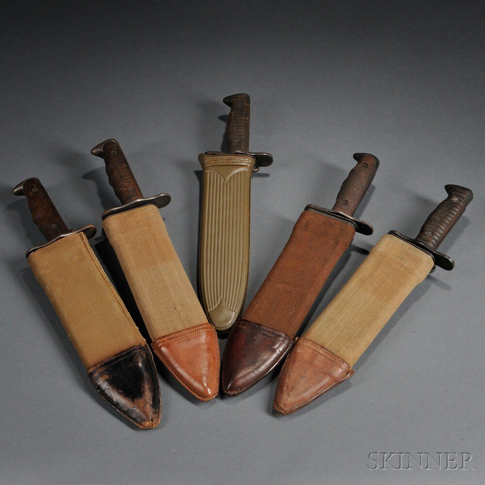 Appraisal: Four Model and One Model Bolo Knives with Scabbards c