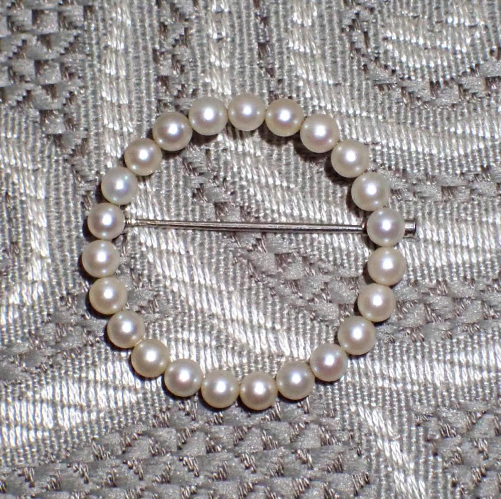 Appraisal: MIKIMOTO AKOYA PEARL AND EIGHTEEN KARAT GOLD PIN the k