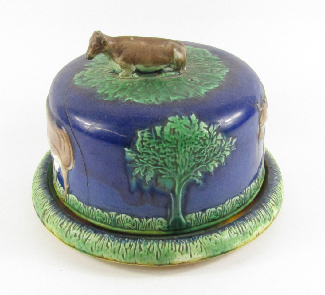 Appraisal: A majolica late thC Stilton dish and cover decorated in