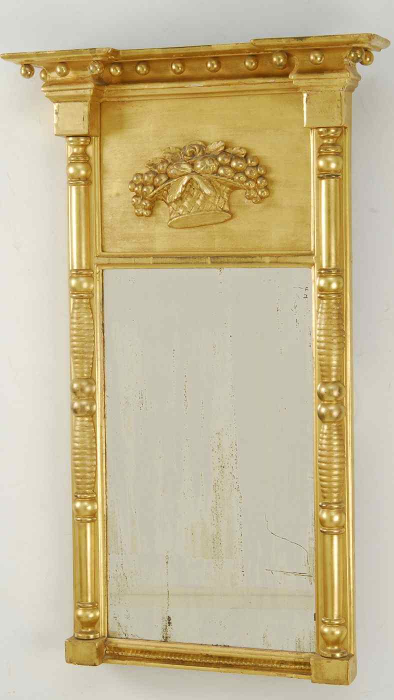 Appraisal: FEDERAL GOLD-LEAF MIRROREarly th CenturyCornice top with ball drops over