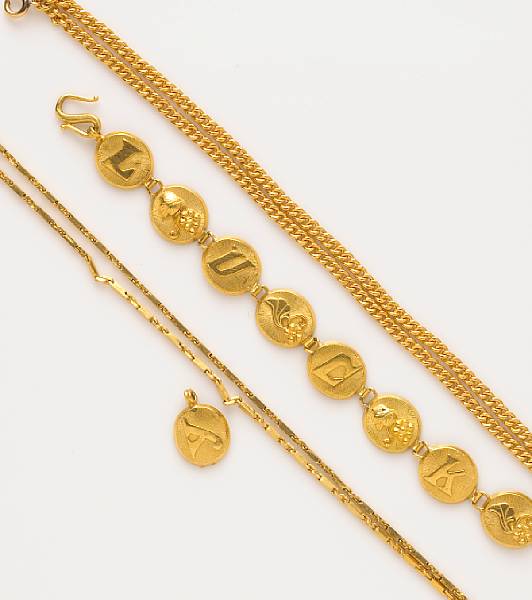 Appraisal: A collection of high karat gold jewelry including two chains