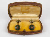 Appraisal: Cartier A fine pair of gold nephrite and ruby cufflinks