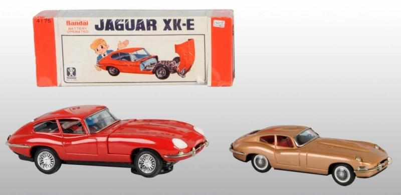 Appraisal: Lot of Tin Jaguar XK-E Automobile Toys Description Japanese Working