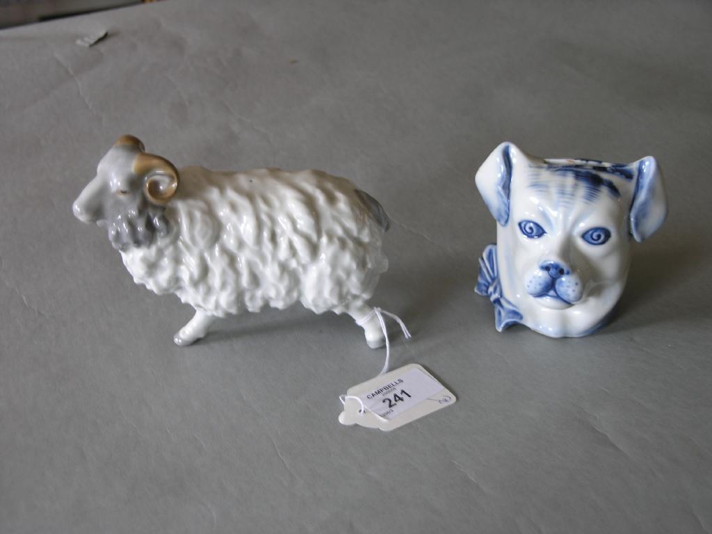 Appraisal: A porcelain model of a ram in long together with