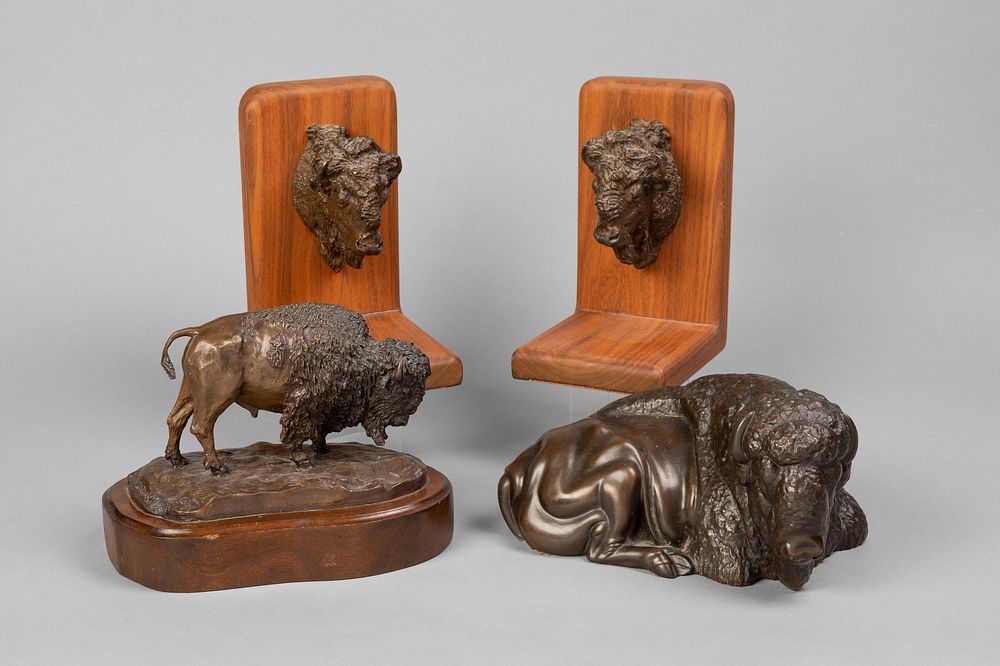 Appraisal: Group of Four Buffalo Bronzes Group of Four Buffalo Bronzes