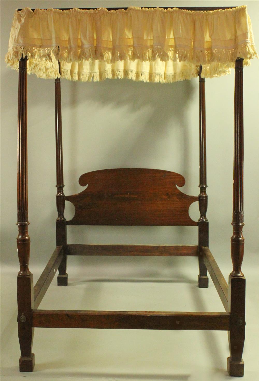 Appraisal: REEDED MAHOGANY PENCIL POST FLAT TOP TESTER BED the arched