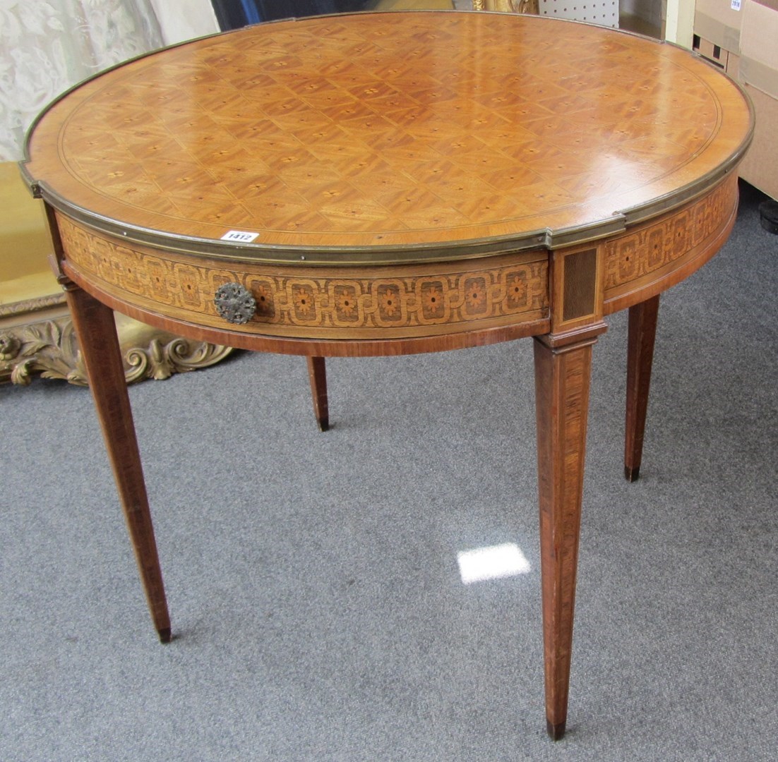 Appraisal: A late th century French parquetry inlaid mahogany gilt metal