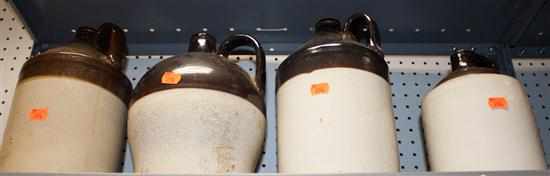 Appraisal: Four brown and white stoneware jugs Estimate - No condition