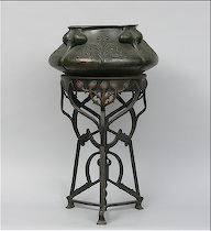 Appraisal: An Art Nouveau Jardiniere Stand A marvelous organic stylized metal