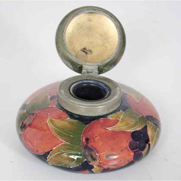 Appraisal: Moorcroft Inkwell English a Moorcroft inkwell with a brass lid