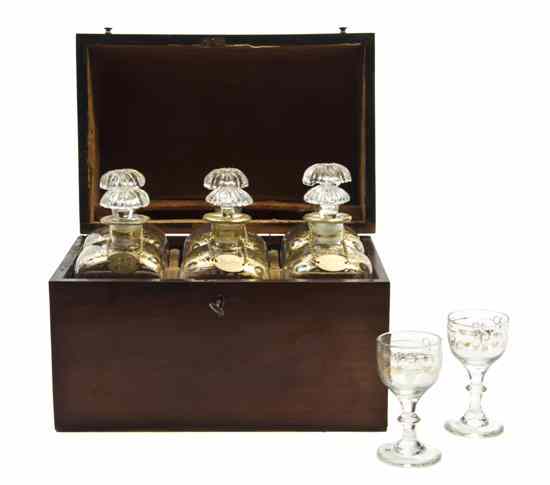 Appraisal: A Continental Mahogany Cased Drinks Set each having gilt decoration