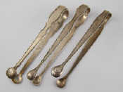 Appraisal: Three pairs of Georgian early brightcut silver sugar tongs two