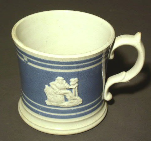 Appraisal: Blue ceramic frog mug h x w