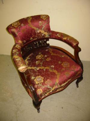 Appraisal: A PAIR OF VICTORIAN ARM CHAIRS of tub form upholstered