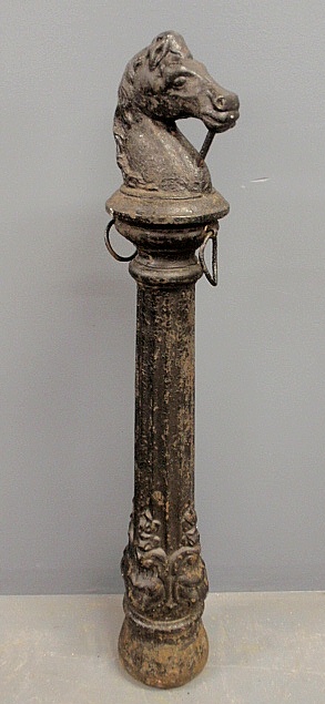 Appraisal: - Victorian cast iron hitching post the top in the