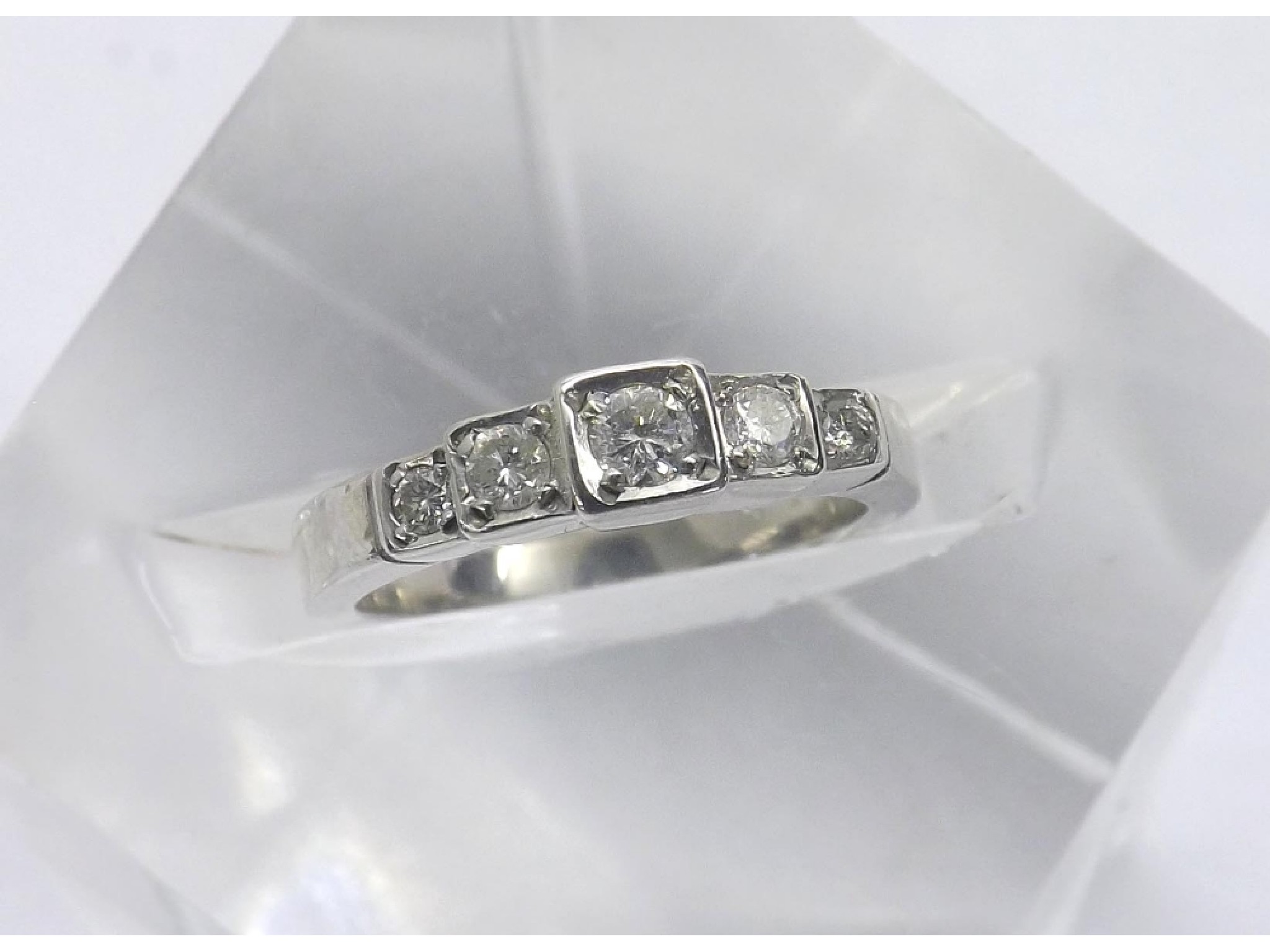 Appraisal: - -a White gold five stone diamond ring in a