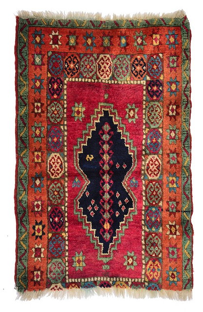 Appraisal: A TURKISH YASTIK OR SMALL MAT with a central blue