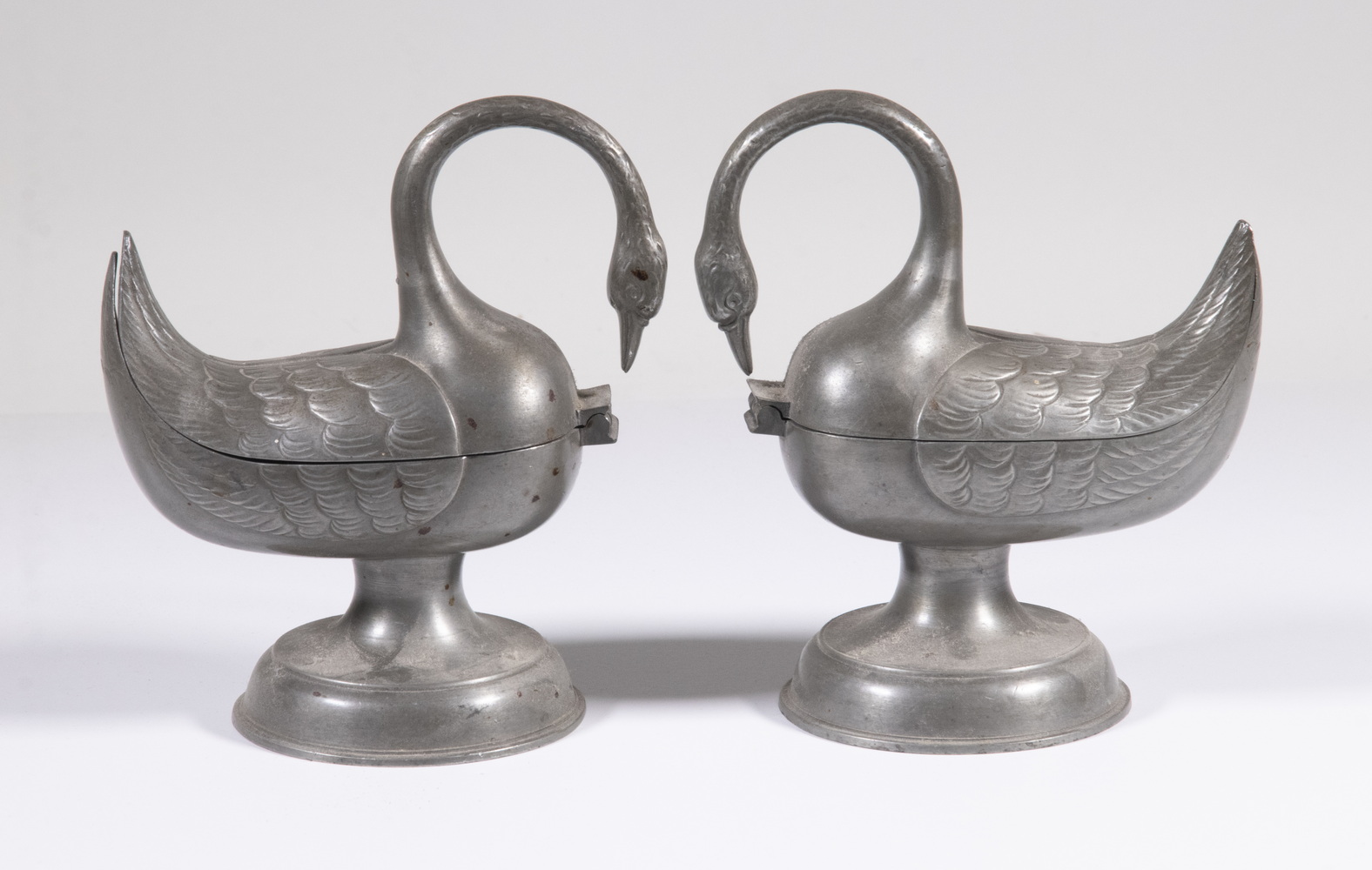 Appraisal: PR SWAN FORM GERMAN PEWTER MASTER SALTS Pair of Circa