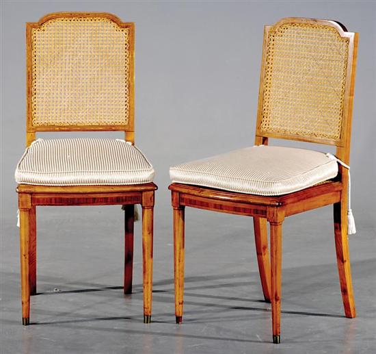 Appraisal: Four Sheraton style cherry and cane side chairs circa cartouche-form