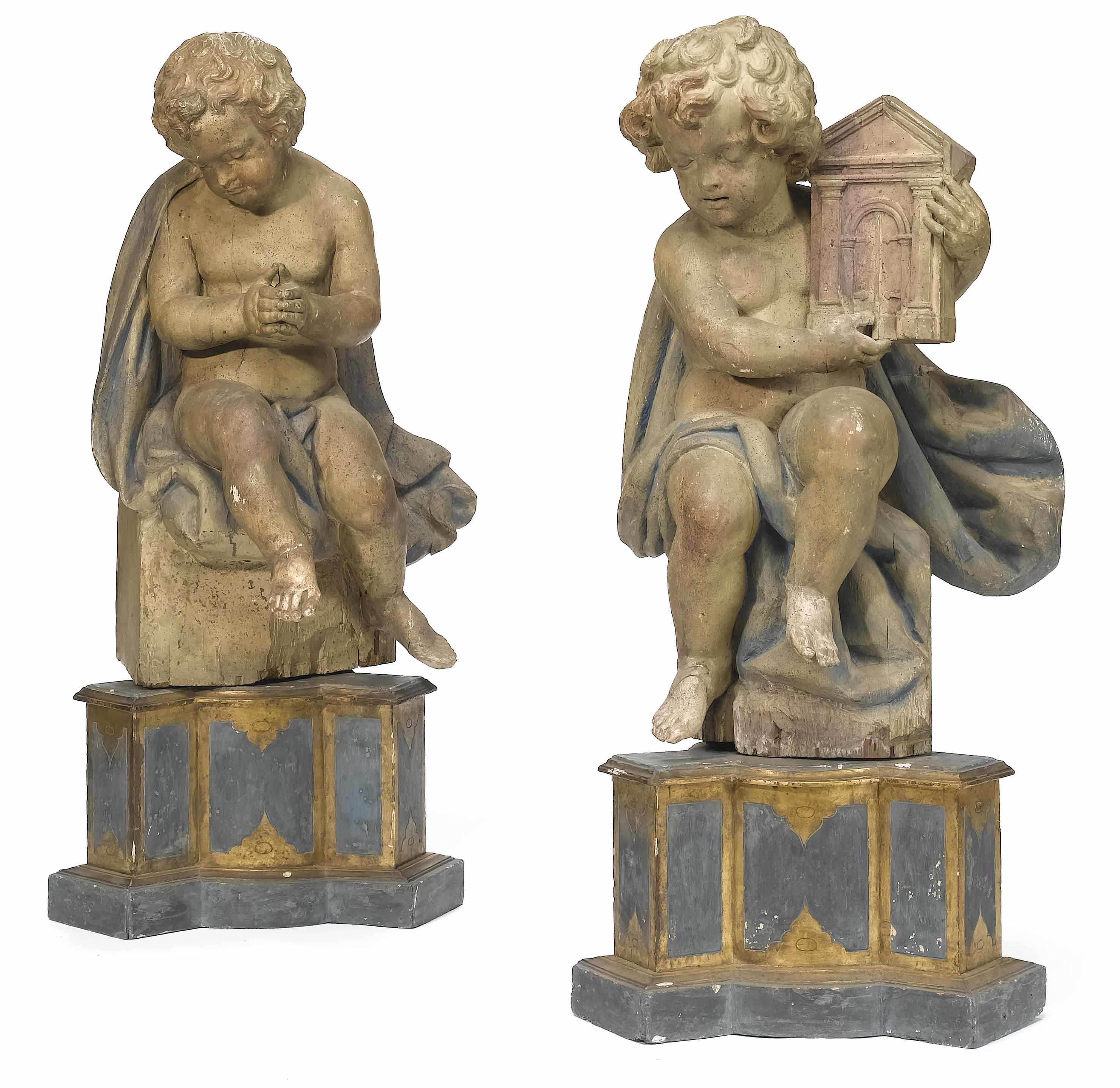 Appraisal: A pair of Italian carved wood figures of putti late