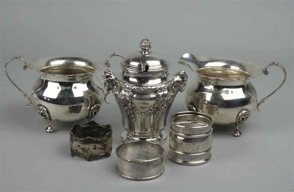 Appraisal: GEORGIAN STYLE STERLING CREAMER AND SUGAR each supported on lion