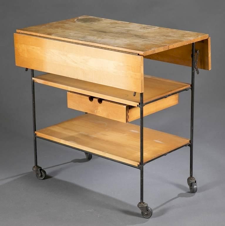 Appraisal: Paul McCobb bar cart A Paul McCobb bar cart by